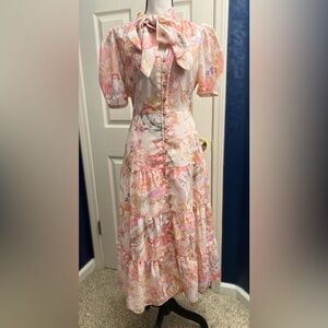 Elegant Floral Midi Dress with Bow Detail